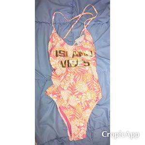 NWT. Island vibe print one piece bikini. Size S.